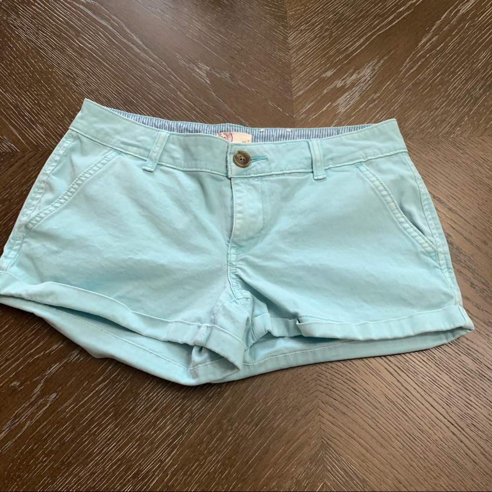 So light turquoise shorts with cuff Size 7